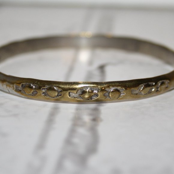 Vintage Jewelry - Beautiful Vintage gold bangle bracelet with sun and tribal stamps 7"